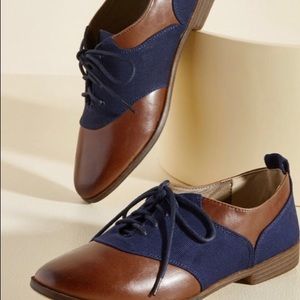 Brown and navy blue oxfords
